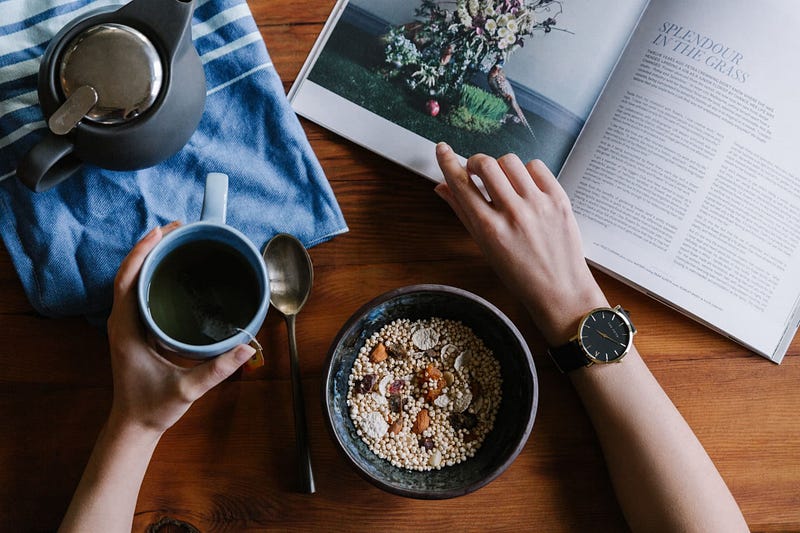 A cup of coffee with a serene morning backdrop