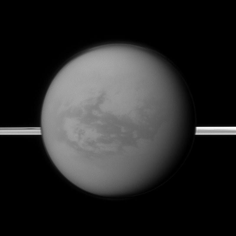 Titan with Saturn's rings