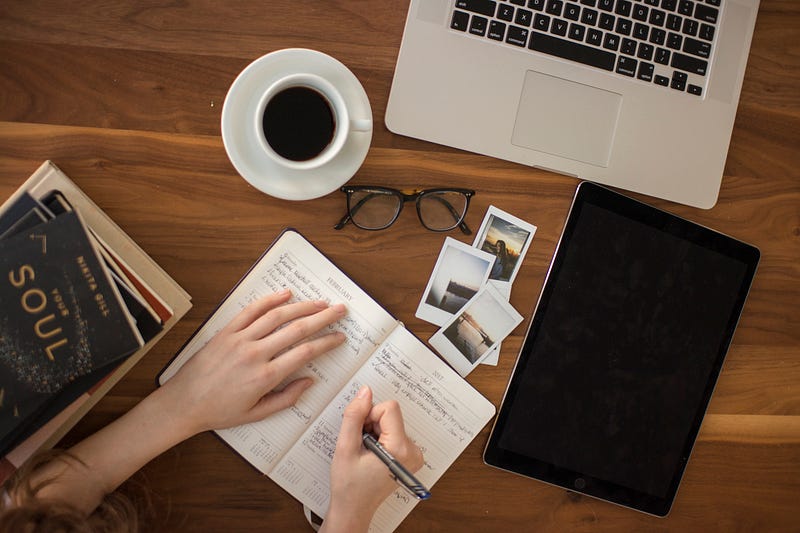 Image of a person coding at a desk