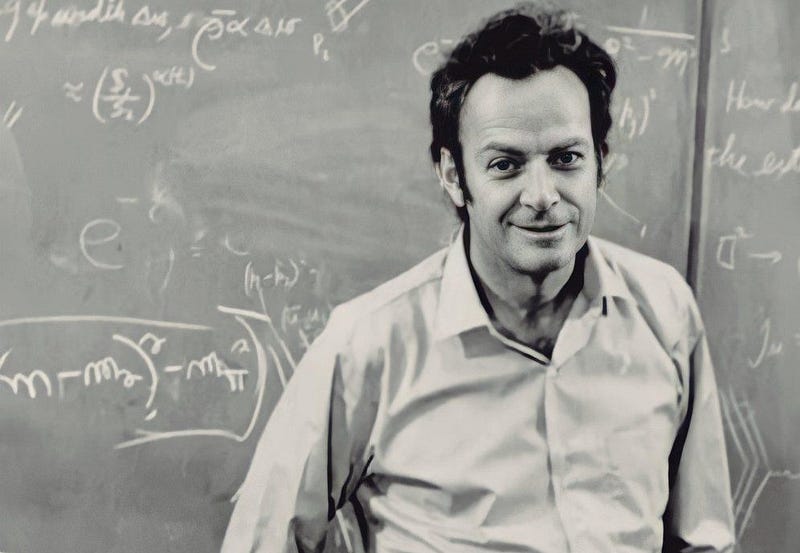 Richard Feynman teaching at a blackboard.