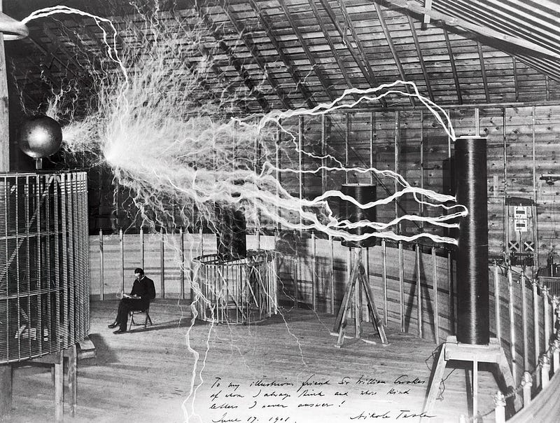 Historic photograph of Tesla in his laboratory