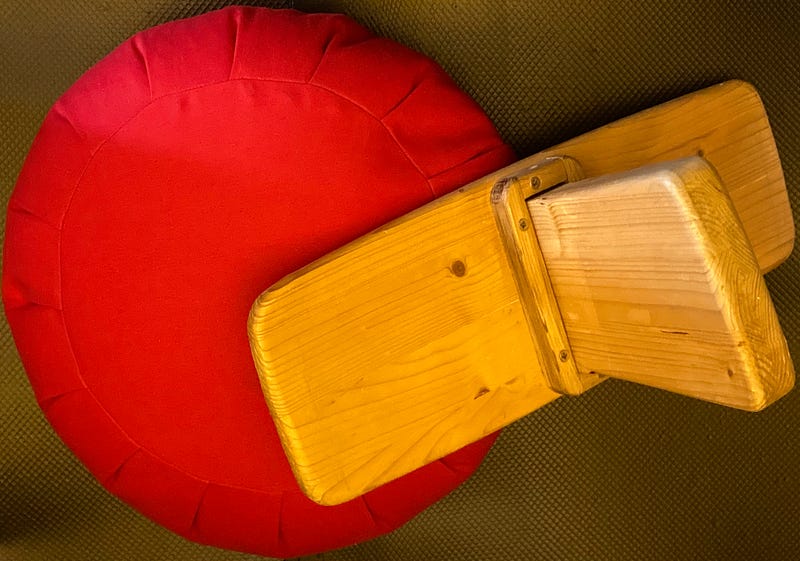 Meditation stool and cushion as part of daily practice